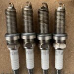 Will New Spark Plugs Fix Rough Idle