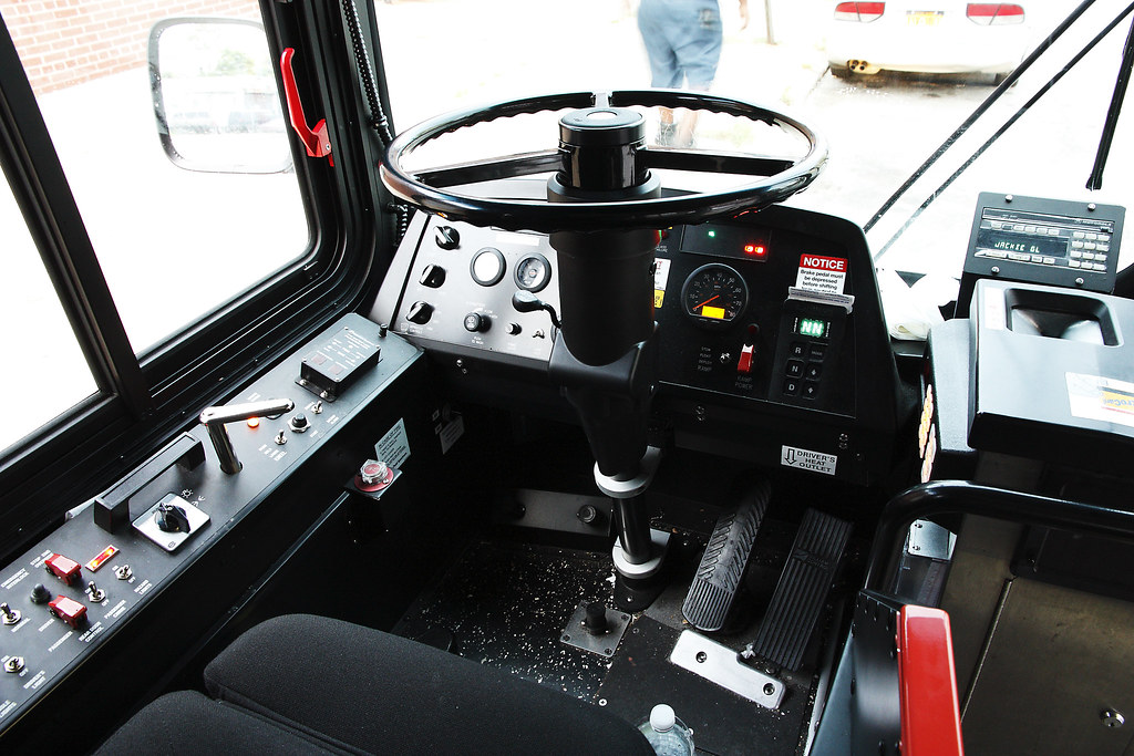 Why are Bus Steering Wheels Flat